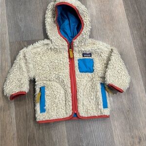 Patagonia Blue Jacket with Cream Fleece and Red Trim